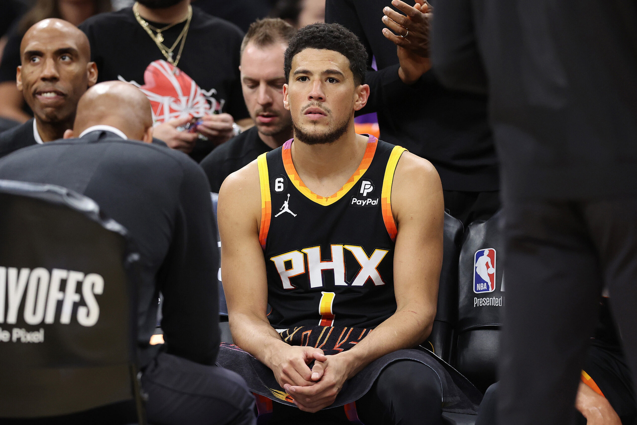 Devin Booker in his NBA jersey.