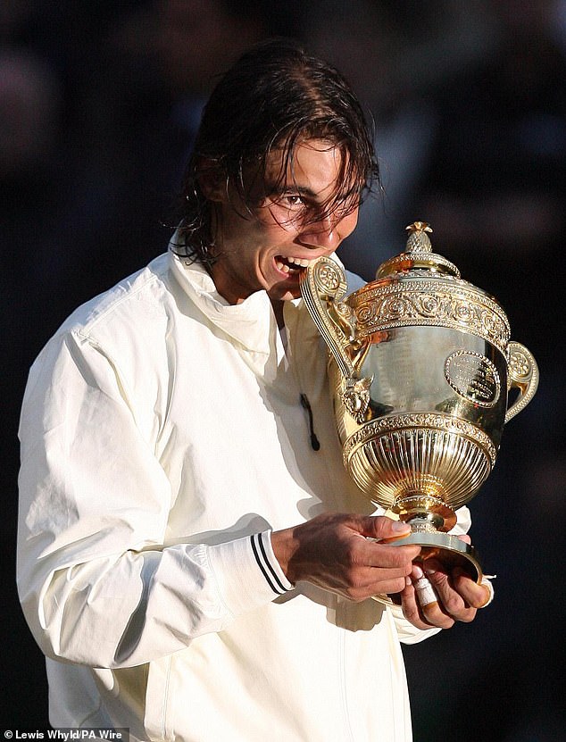 Nadal with the Wimbledon trophy in 2008 after his five-set victory over Federer