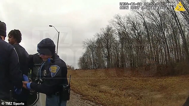 Indiana state police are seen cuffing Rajon Rondo about an hour from his native Louisville