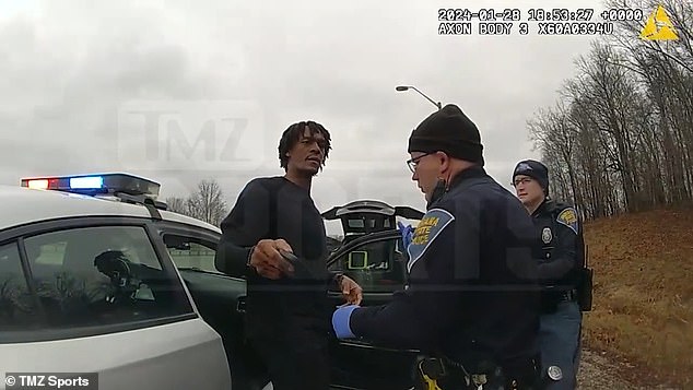 Rajon Rondo is seen speaking with officers on January 28 in southern Indiana