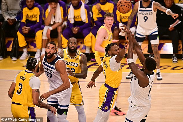 Bronny James plays defense in his NBA debut as his father LeBron watches closely