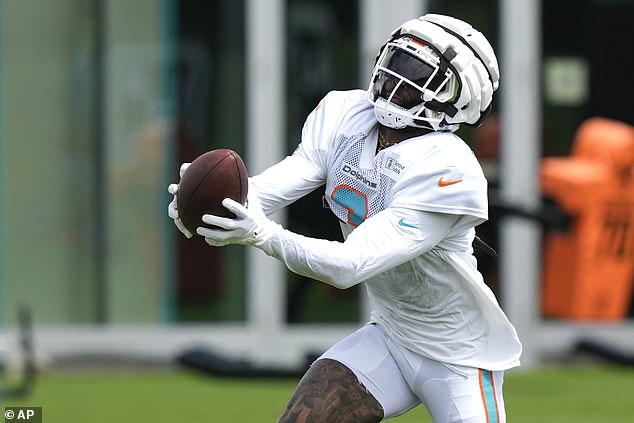 Miami Dolphins wide receiver Odell Beckham Jr. runs drills during practice on Wednesday