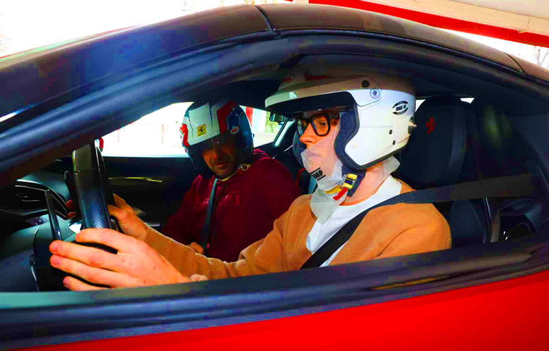 Jannik Sinner taking the wheel of ta Ferrari supercar