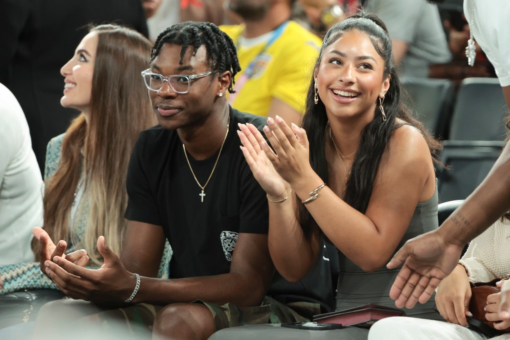 Bryce James and Sadie Johnson at the men's basketball semifinals game between Team USA and Team Serbia at Bercy Arena on August 8, 2024 in Paris, France.