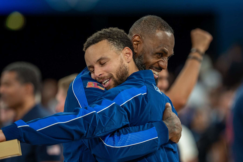 PARIS, FRANCE - AUGUST 10: Players of Team USA celebrate as they win gold medal after defeating France in Men's Gold Medal game on day fifteen of the Olympic Games Paris 2024 at Bercy Arena on August 10, 2024 in Paris, France. (Photo by Aytac Unal/Anadolu via Getty Images)