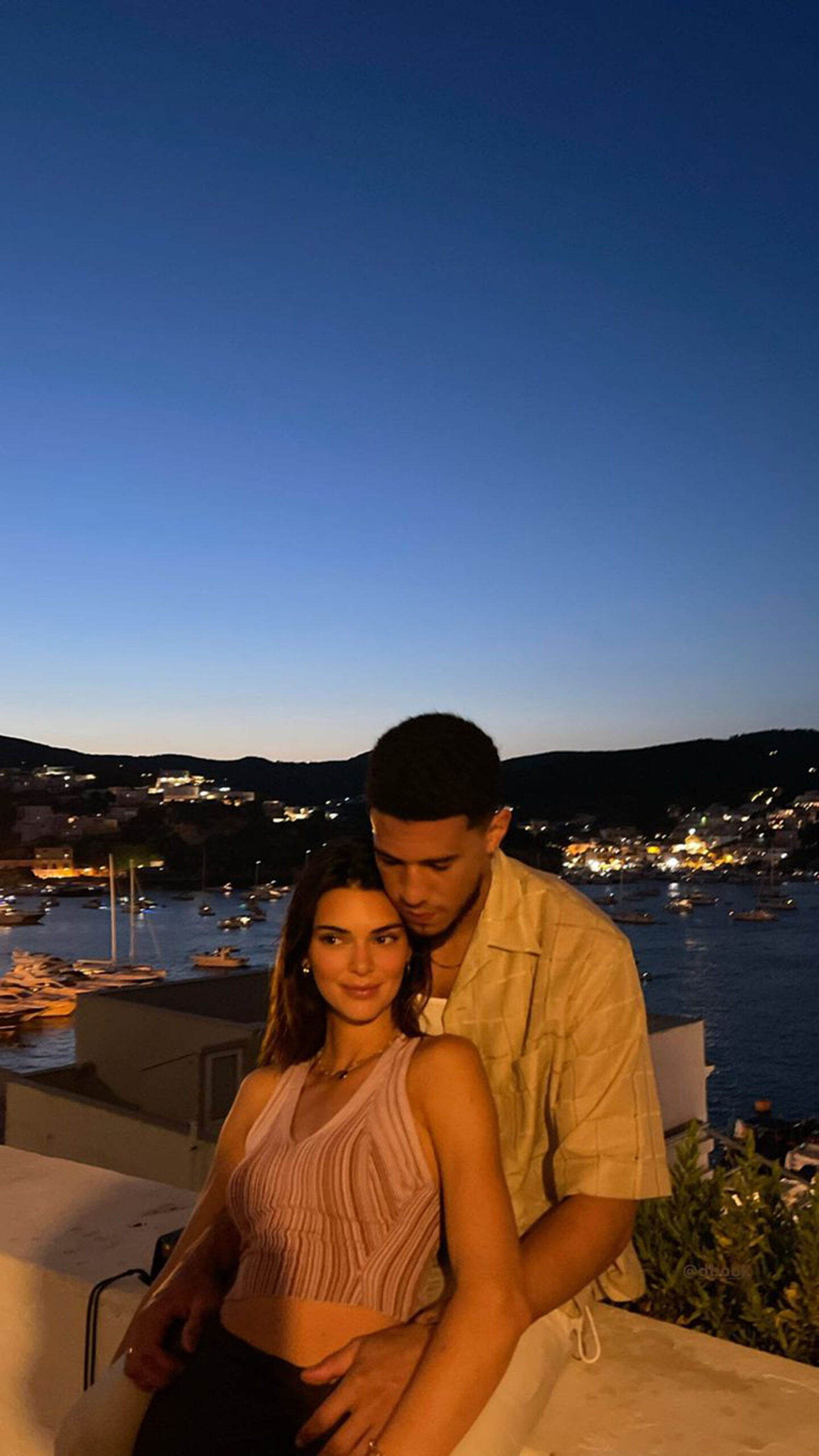 Kendall Jenner cozies up to her Olympian boyfriend, Devin Booker, in Italy.