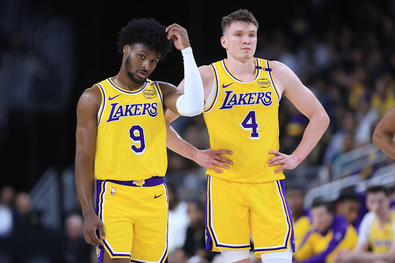 PALM SPRINGS, CALIFORNIA - OCTOBER 04: Bronny James #9 and Dalton Knecht #4 of the Los Angeles Lakers look on during the second half of a game against the Minnesota Timberwolves at Acrisure Arena on October 04, 2024 in Palm Springs, California. (Photo by Sean M. Haffey/Getty Images)