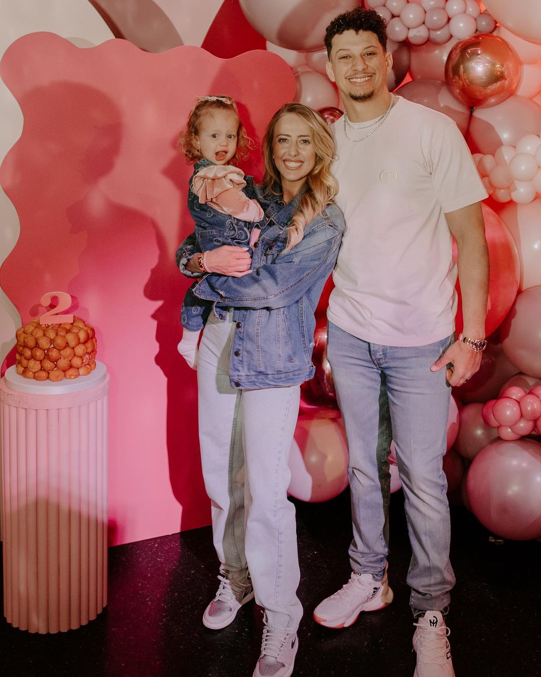 Patrick and Brittany Mahomes with their daughter