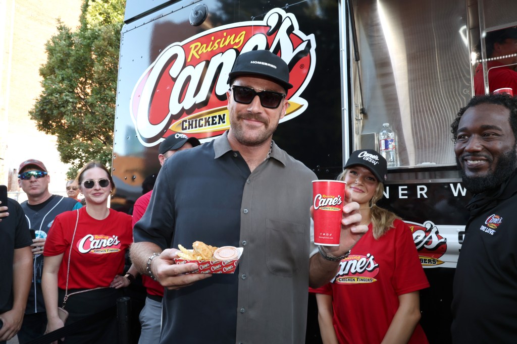 Travis Kelce serves up Raising Cane's at 2nd Annual Kelce Car Jam in Kansas City on October 05, 2024 in Kansas City.