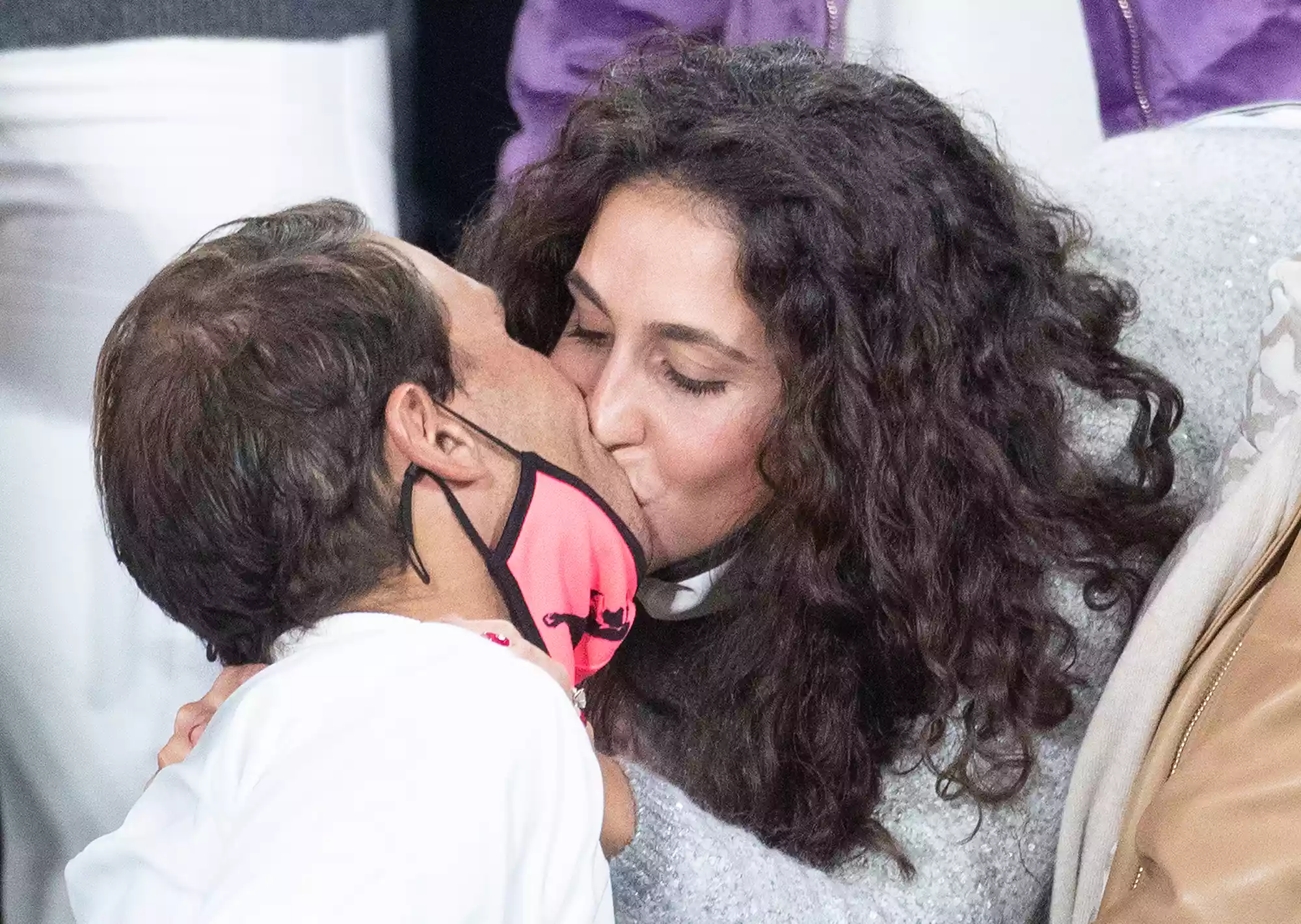 Rafael Nadal of Spain receives a congratulatory kiss from his wife Xisca Perello after his victory against Novak Djokovic of Serbia in the Men's Singles Final on Court Philippe-Chatrier during the French Open Tennis Tournament at Roland Garros on October 11th 2020 in Paris, France