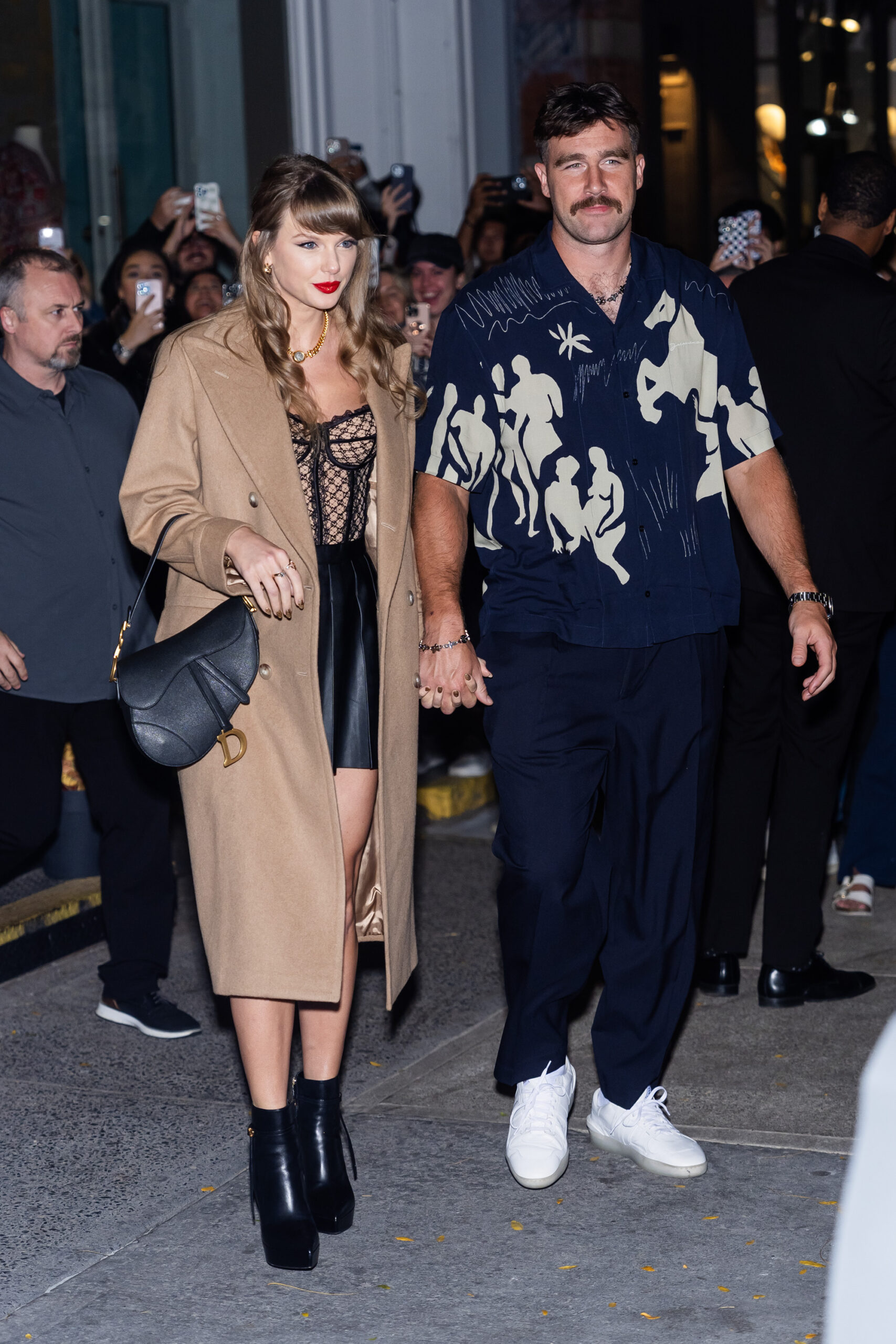 Travis Kelce and Taylor Swift on Oct. 11 at The Corner Store.