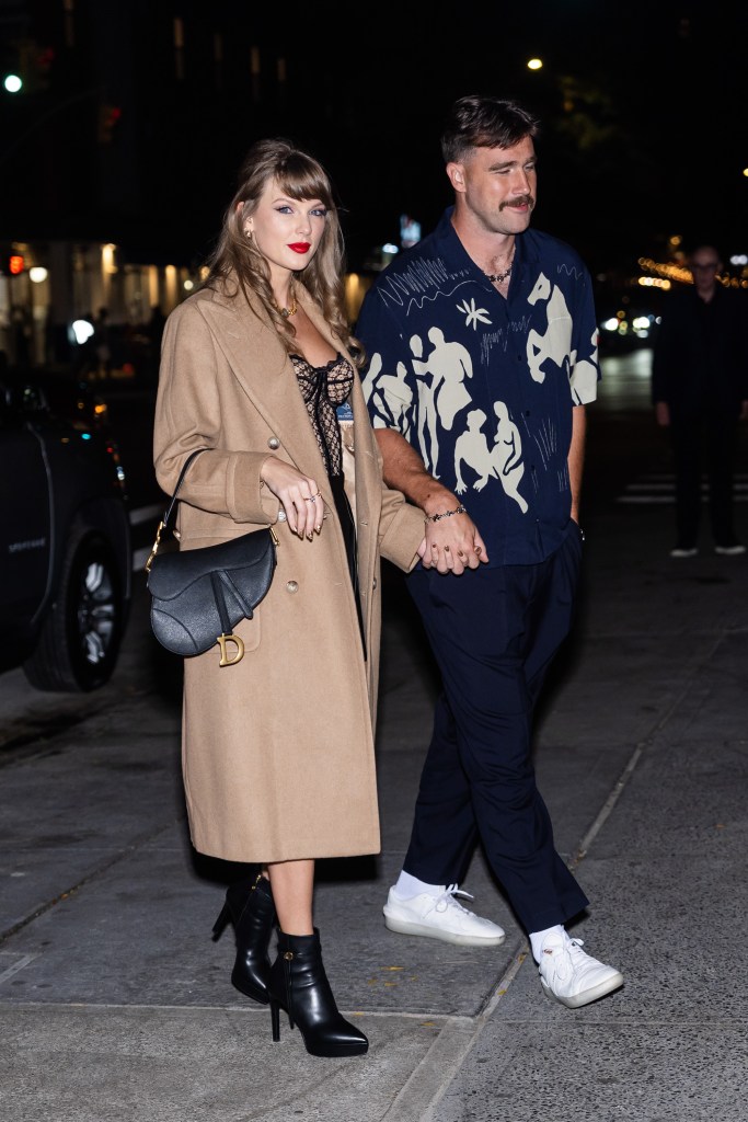 Taylor Swift and Travis Kelce at The Corner Store on Oct. 11.