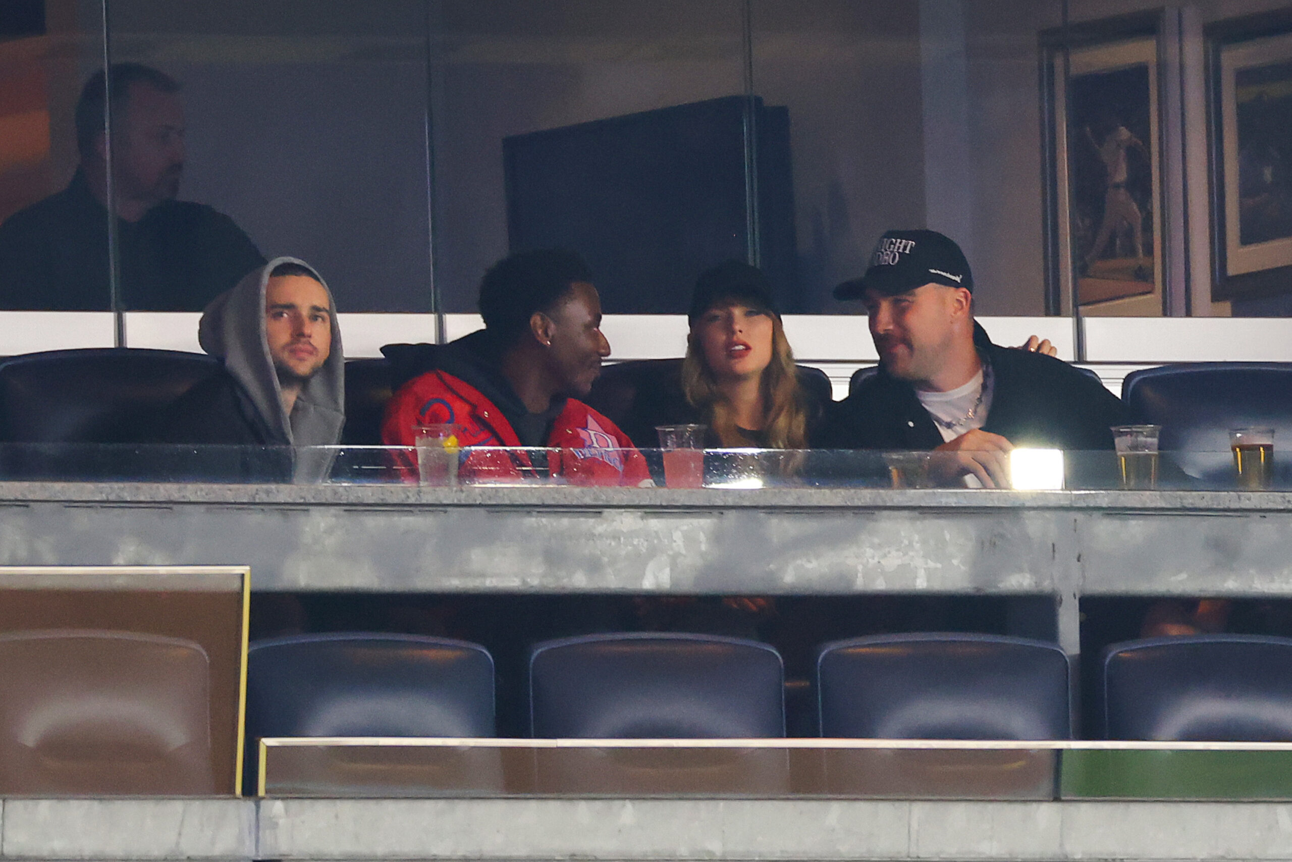 Taylor Swift and Travis Kelce at an MLB Playoff game in New York on Oct. 14, 2024