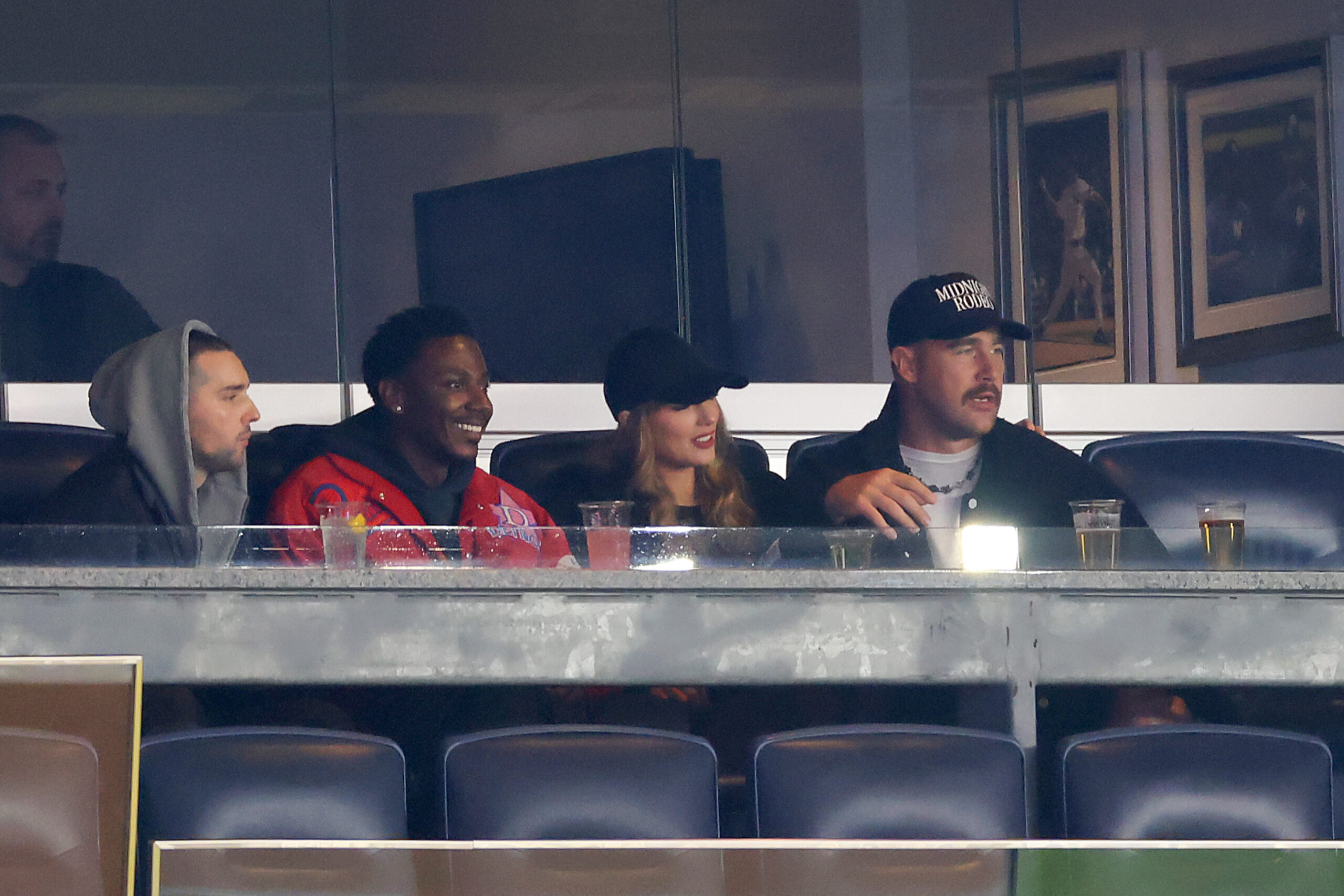 Taylor Swift and Travis Kelce at an MLB Playoff game in New York on Oct. 14, 2024