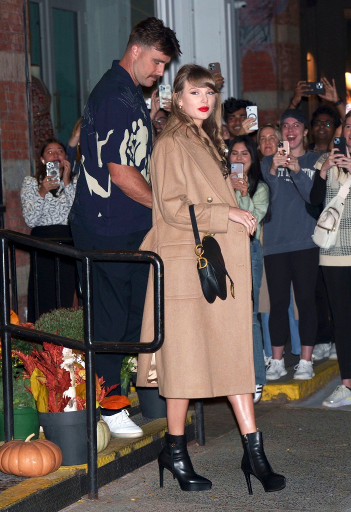 Travis Kelce and Taylor Swift on Oct. 11 at The Corner Store.