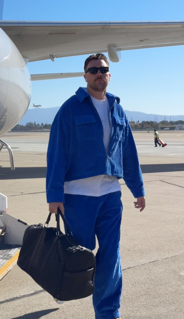 Travis Kelce channels Taylor Swift's 'Midnights' era in blue corduroy ensemble ahead of Chiefs vs. 49ers game on October 20th.