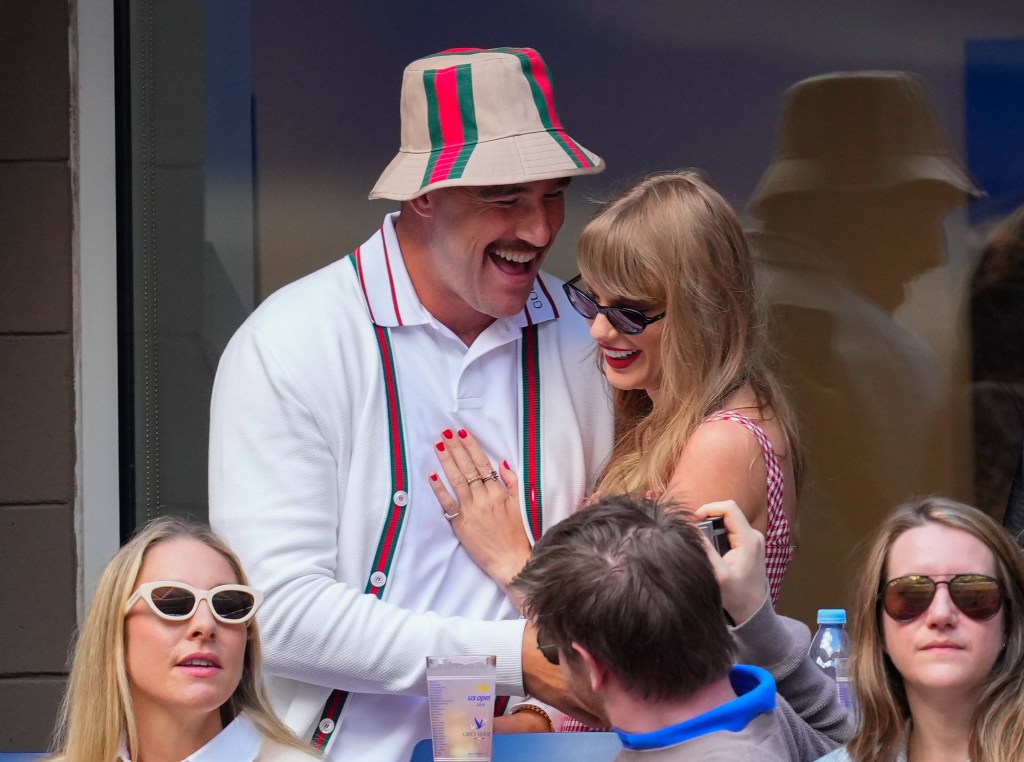 Travis Kelce and Taylor Swift laughing