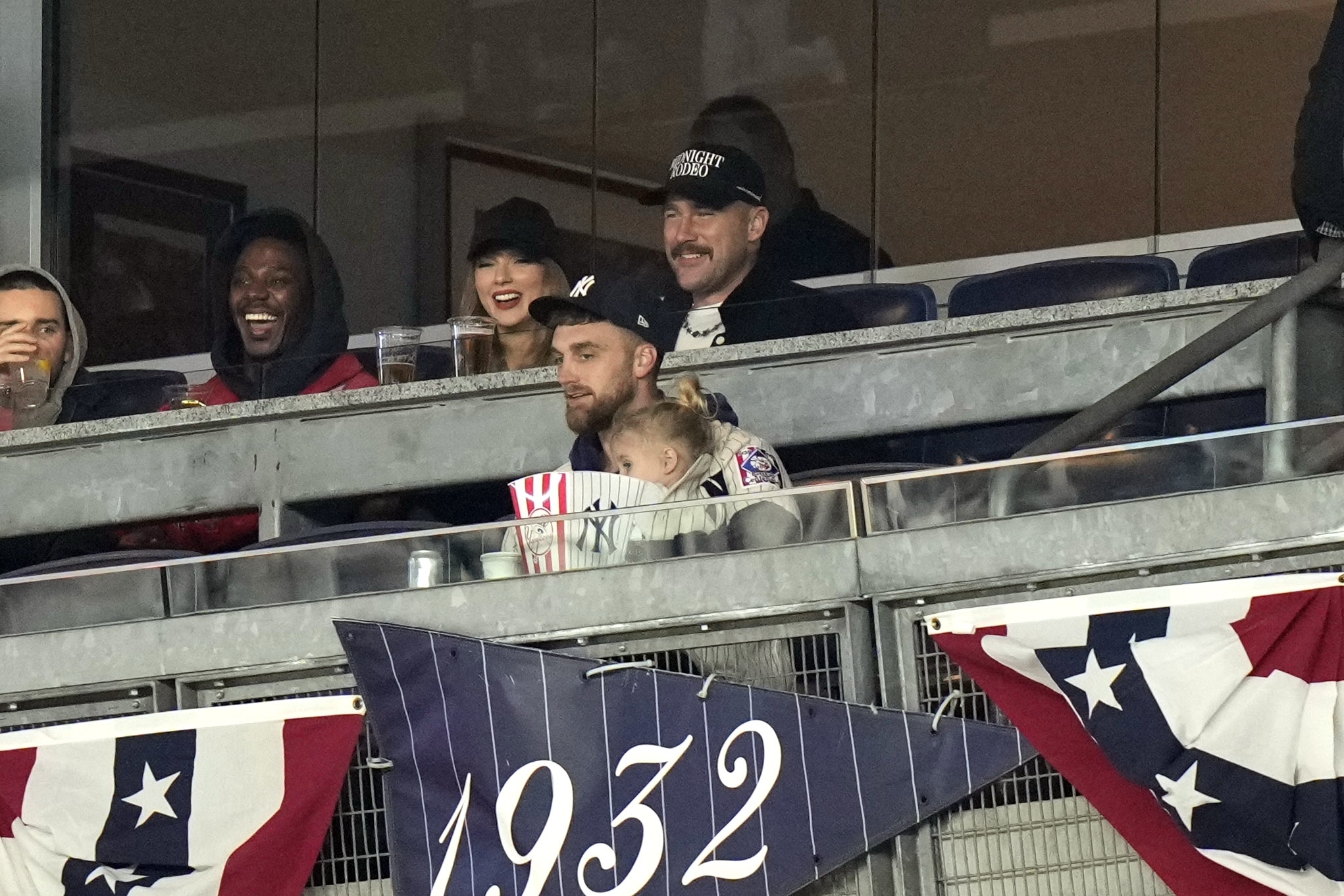 Taylor Swift and Travis Kelce at an MLB Playoff game in New York on Oct. 14, 2024