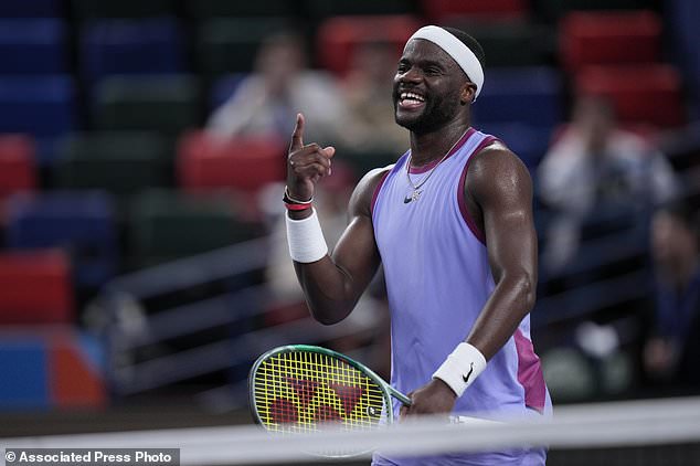 Frances Tiafoe of the United States reacts after defeating Zhou Yi of China in the men's singles second round match in the Shanghai Masters tennis tournament at Qizhong Forest Sports City Tennis Center in Shanghai, China, Monday, Oct. 7, 2024. (AP Photo/Andy Wong)