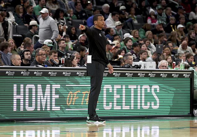 Boston Celtics head coach Joe Mazzulla calls plays during the second half of a preseason NBA basketball game against the Toronto Raptors, Sunday, Oct. 13, 2024, in Boston. (AP Photo/Mark Stockwell)