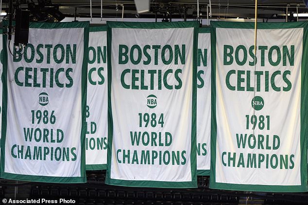 FILE - Boston Celtics basketball banners are seen in the rafters at TD Garden, Wednesday, March. 27, 2024, in Boston. (AP Photo/Michael Dwyer, File)